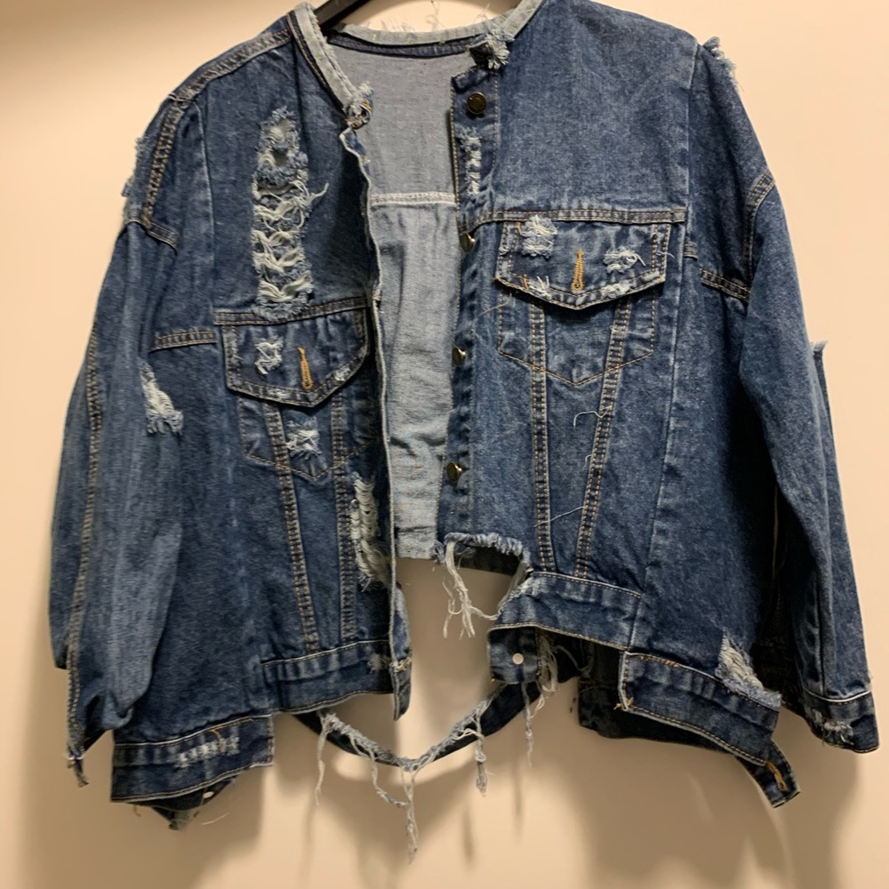 Distressed jean jacket